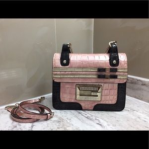 Guess mini, top handle, and or cross body purse.
