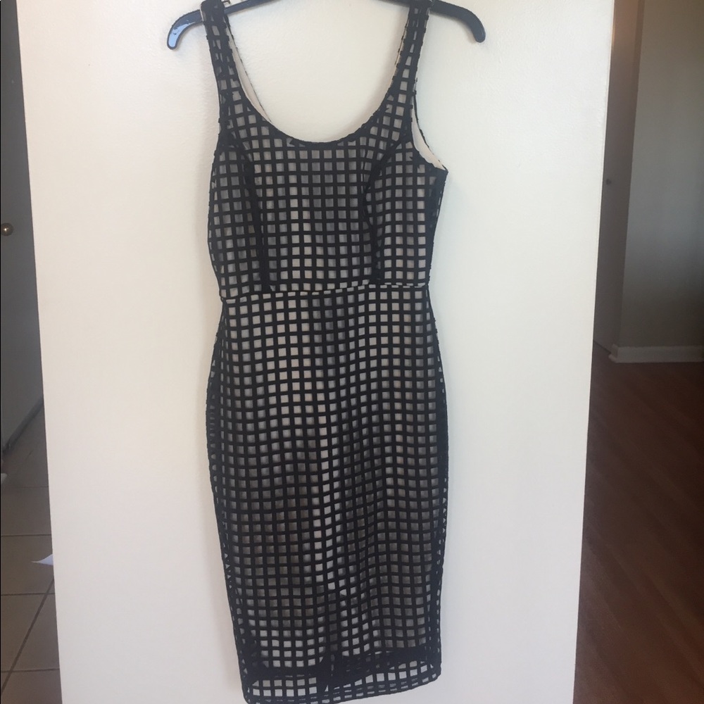 Black dress with nude underneath