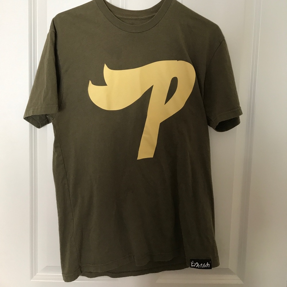 a T-shirt form the company Pink Dolphin Clothing