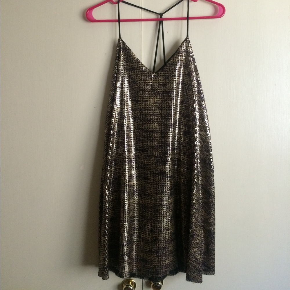Gold Dress with a low hang back
