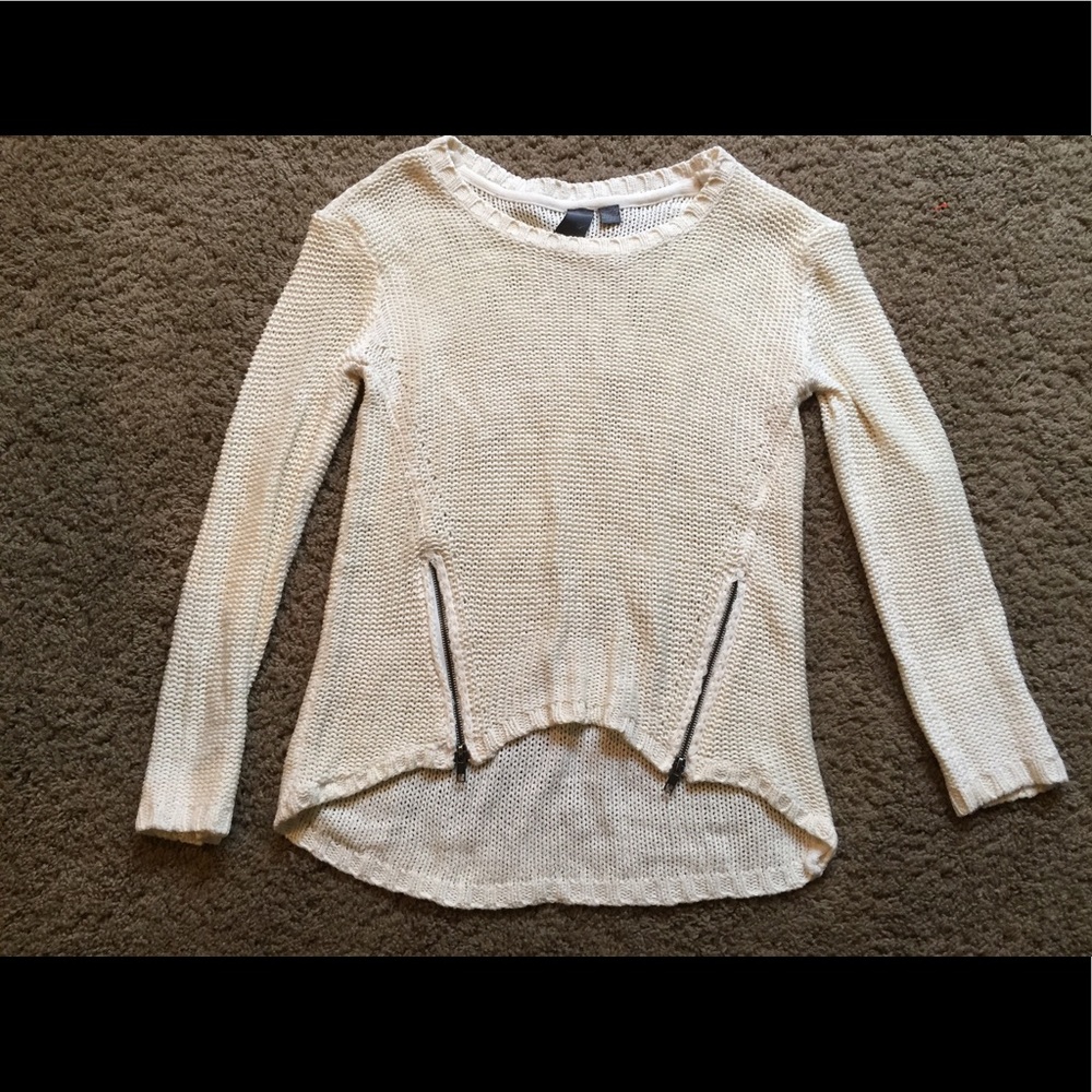 Francesca's white sweater