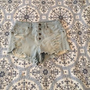 Denim shorts with lace pocket detail