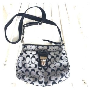 Gently used Coach cross body clutch