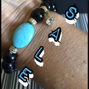 3 FOR $15.                   Black & Gold Bracelet