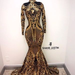 Beautiful black and gold sequin dress.