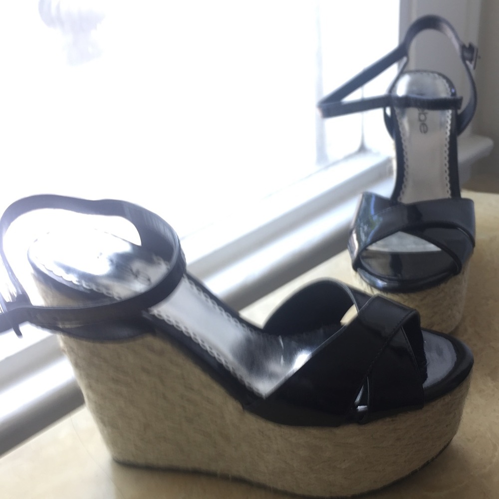 Bebe Brand New Size 7 Wedges Never Worn.