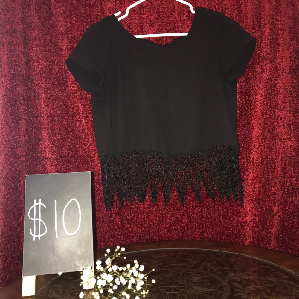 Black blouse with fringe design on the bottom