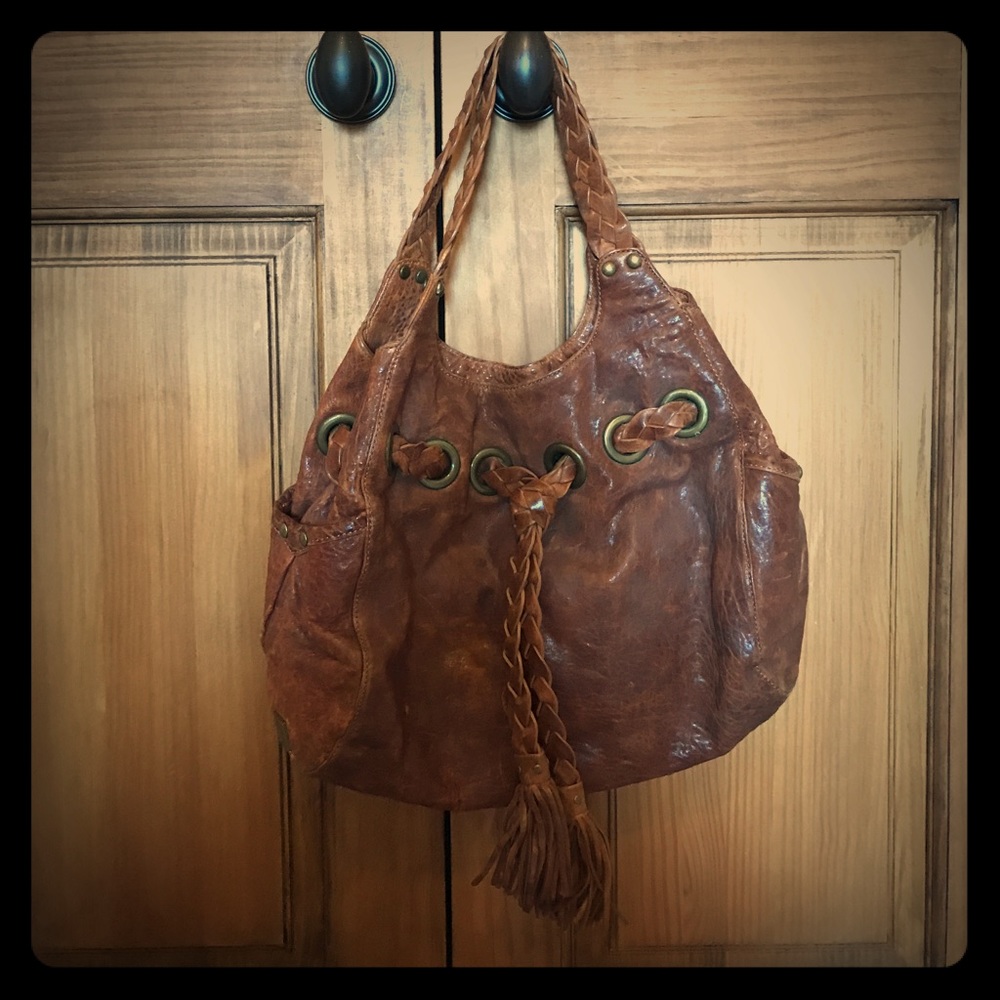 Kooba distressed leather shoulder bag with tassels