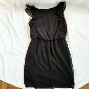 Black knee length ruffled dress