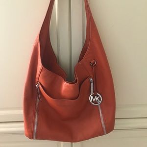 Michael Kors orange leather hobo