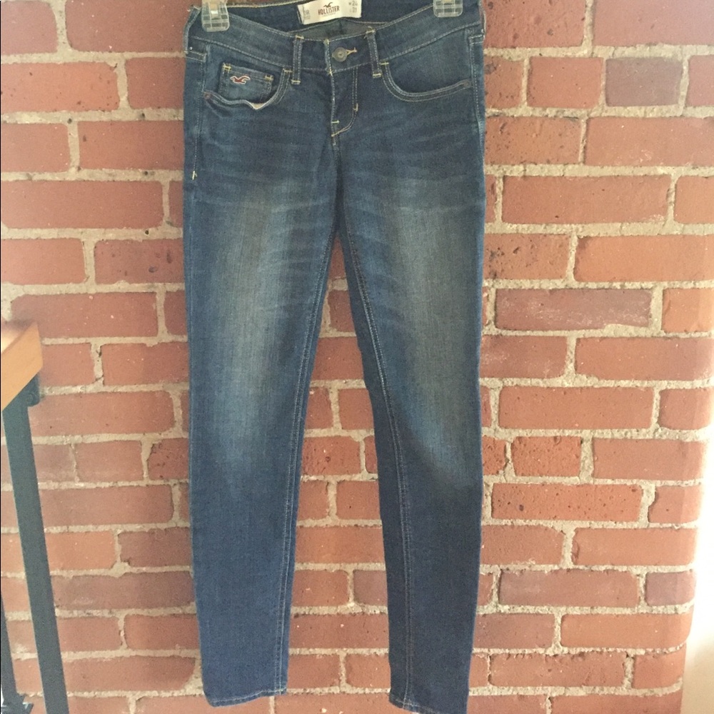 Hollister, dark/medium wash jeans.