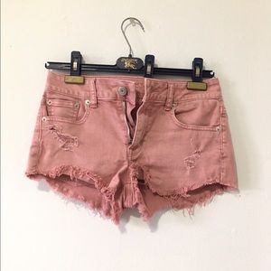 American Eagle pink frayed denim shorts