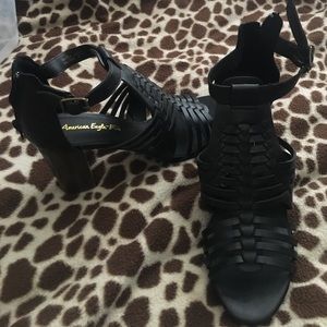 Black American Eagle heels.