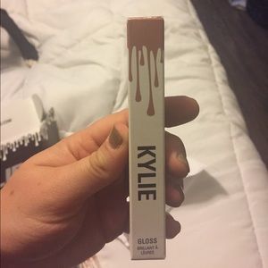 Literally lip gloss unopened.