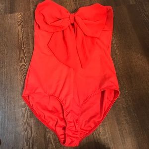 Coral bow bodysuit