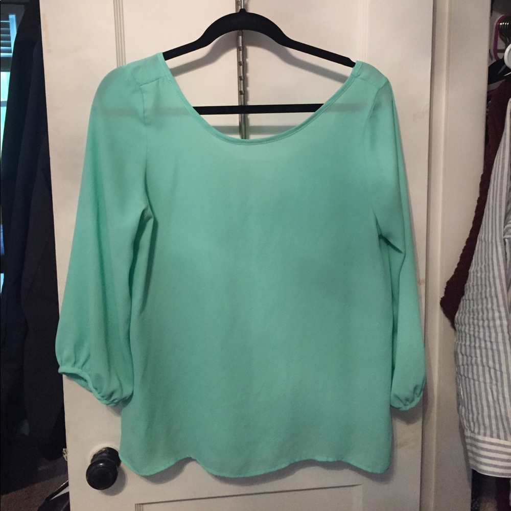 Turquoise Shirt with Bow on Back