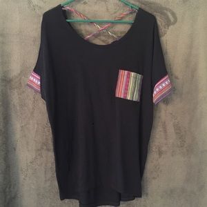 navy blue shirt with colorful stitching