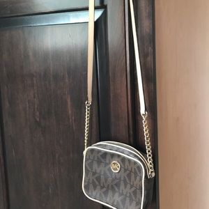 Small MK Jet set slightly used brown