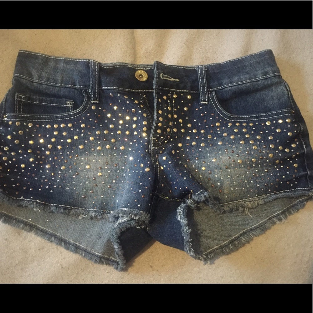 Junior YMI bedazzled denim shorts.