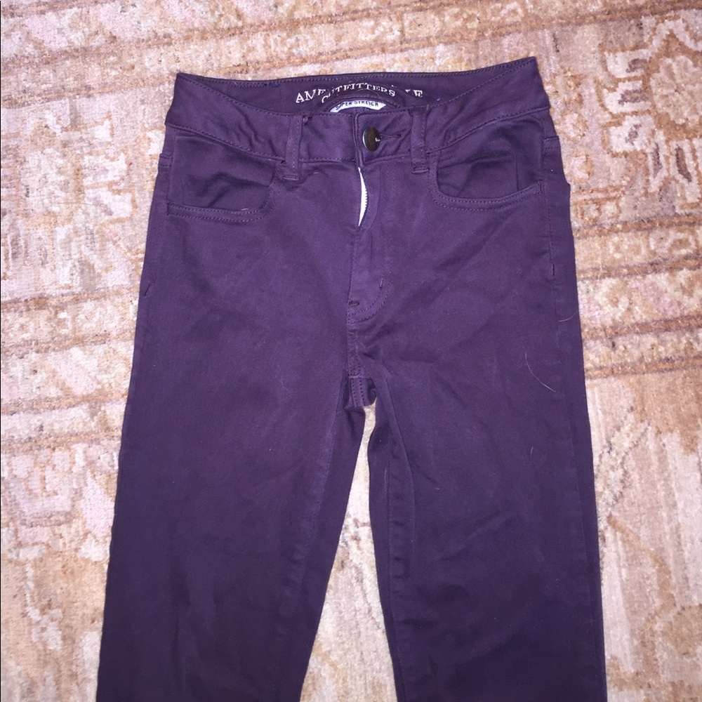 Women's wine colored jeans American eagle