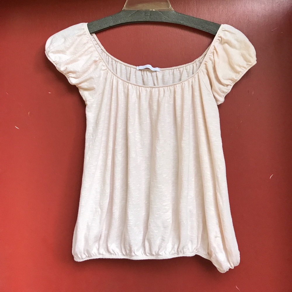 Top with elastic at waist