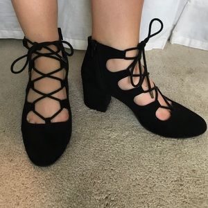 Trendy black suede lace up heels
