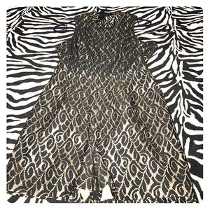 Black and gold sequined romper.