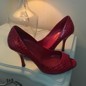 Ruby red patent leather animal print peep toe pump
