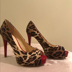 Guess cheetah pumps