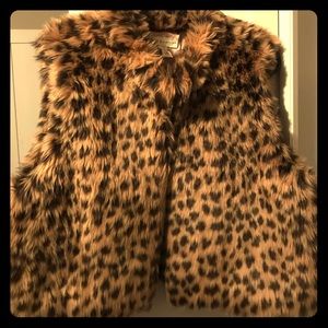 Leopard print faux fur vest.