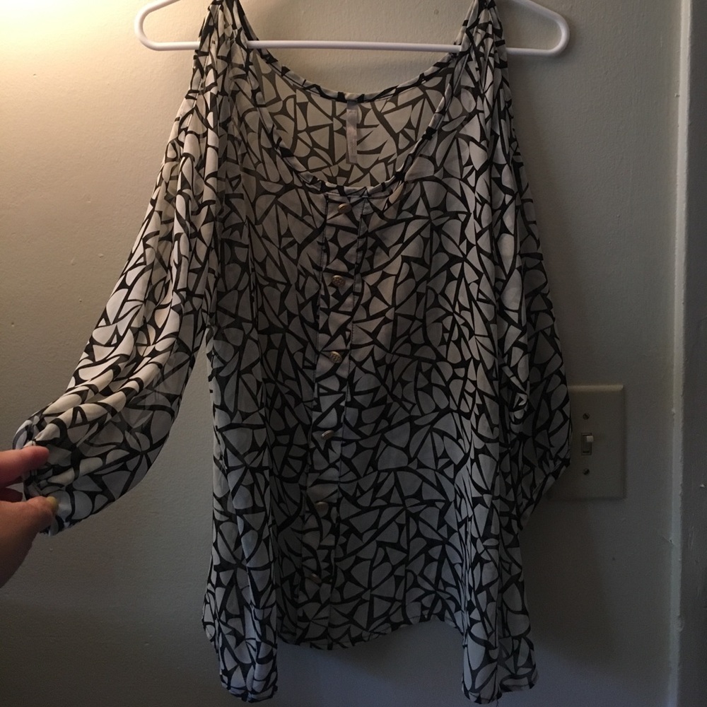 Black and white blouse with gold buttons