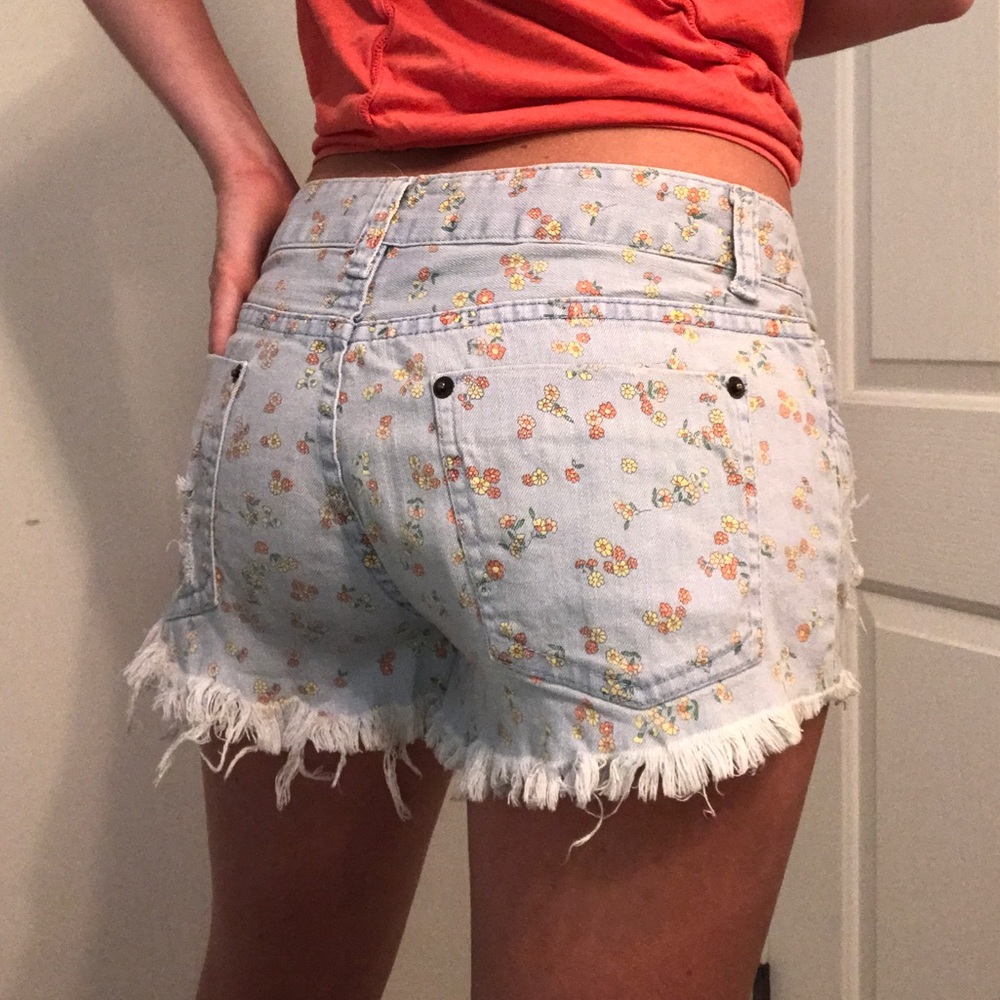 Billabong floral print jean short cut offs