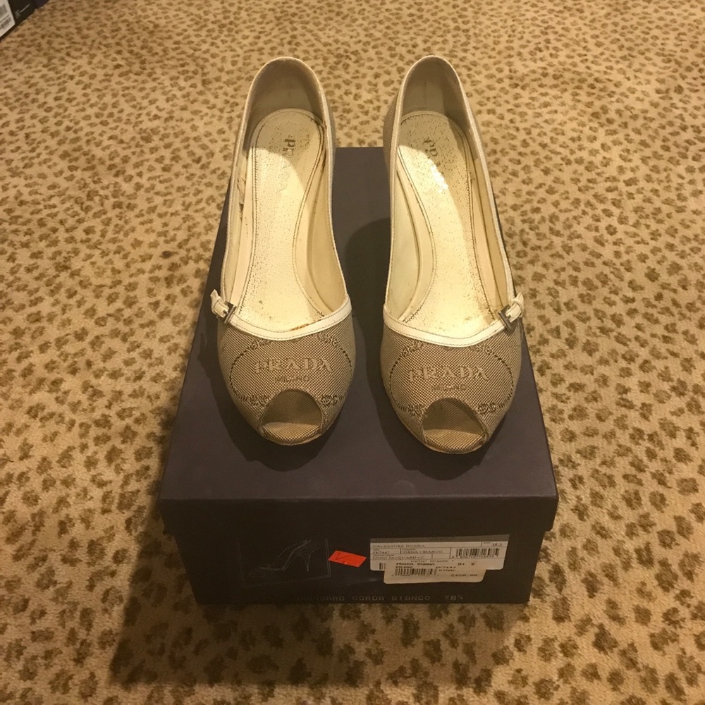 Prada tan and ivory logo peep toe pumps