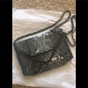 Black and gray skin bag