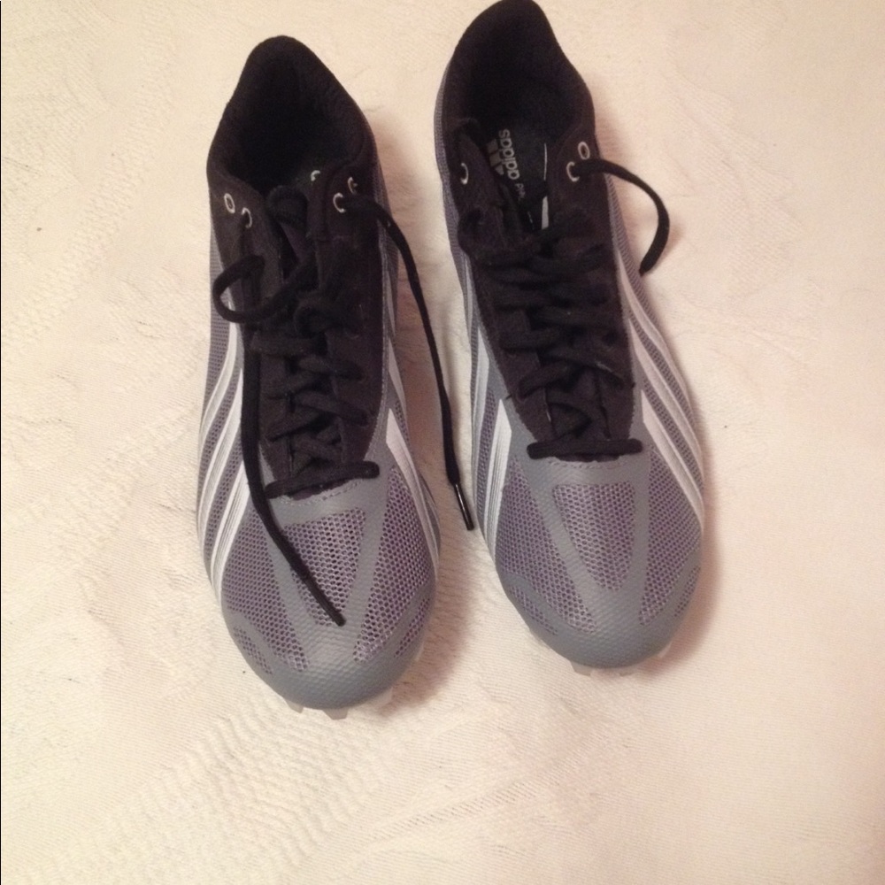Men's 10.5 Adidas track and field shoes.