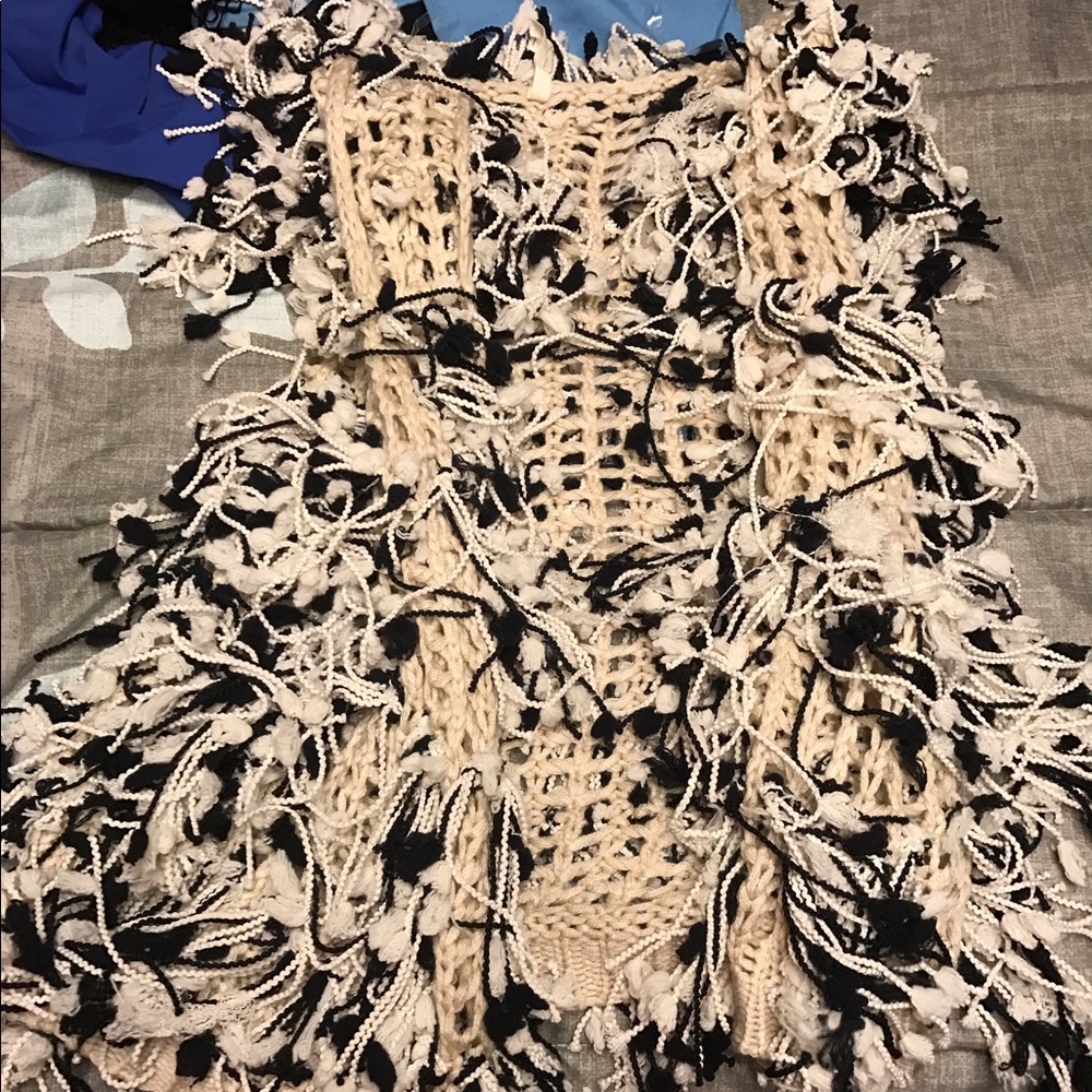 Cardigan sleeveless