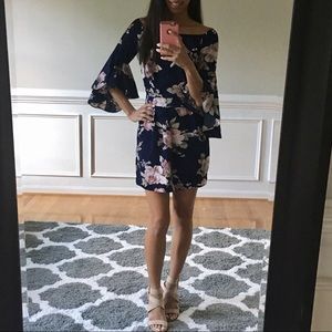 Off the shoulder Floral print dress. Flared sleeve