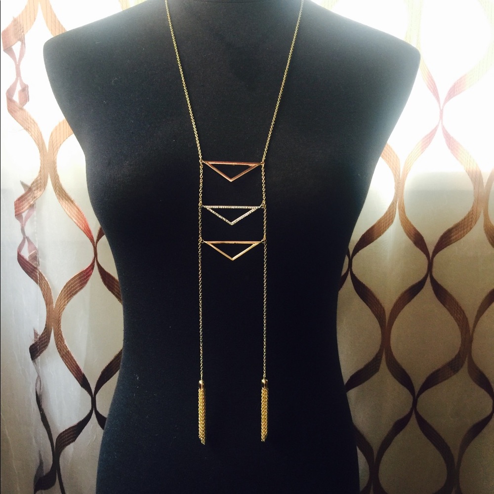 Long gold necklace