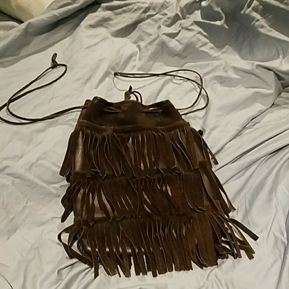 Vintage from the 70's brown  leather fringe purse