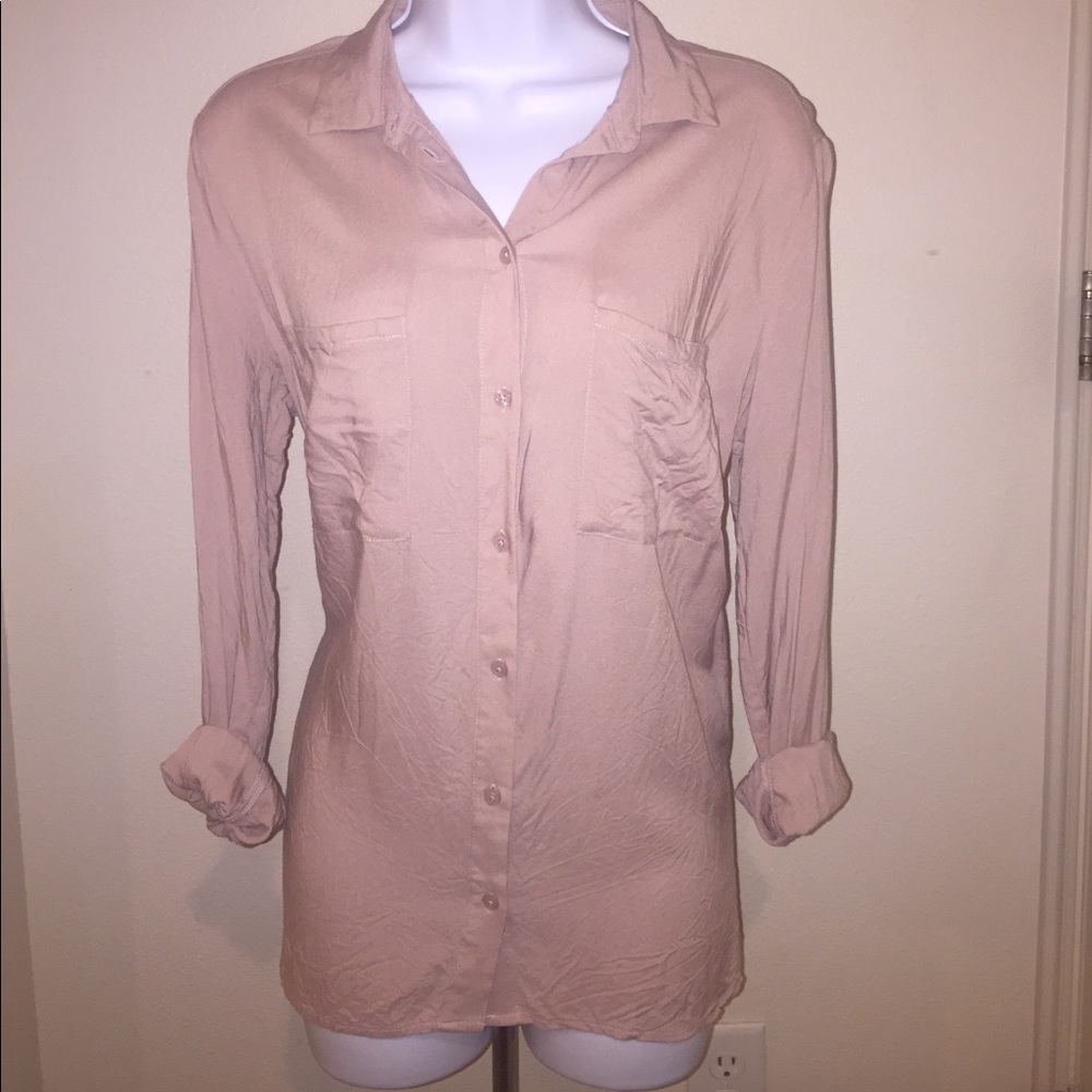 Never worn. Women's light pink button down blouse.
