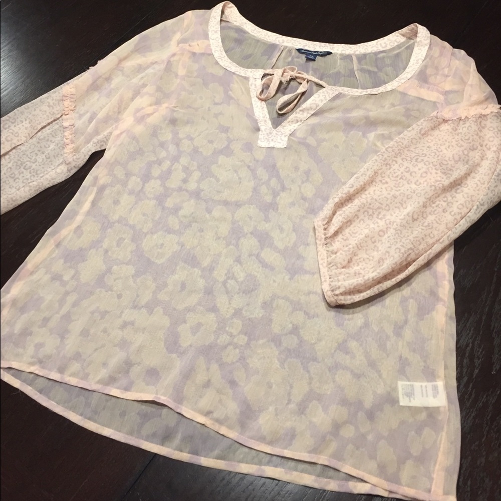 Animal print sheer blouse with tie front