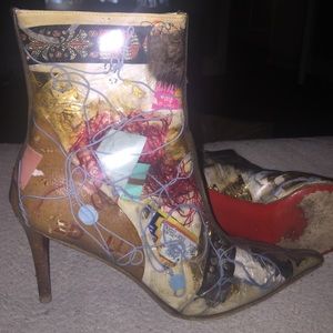 Gently worn Christian Louboutin ankle bootie