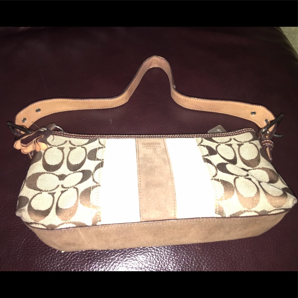 Authentic Coach monogram clutch