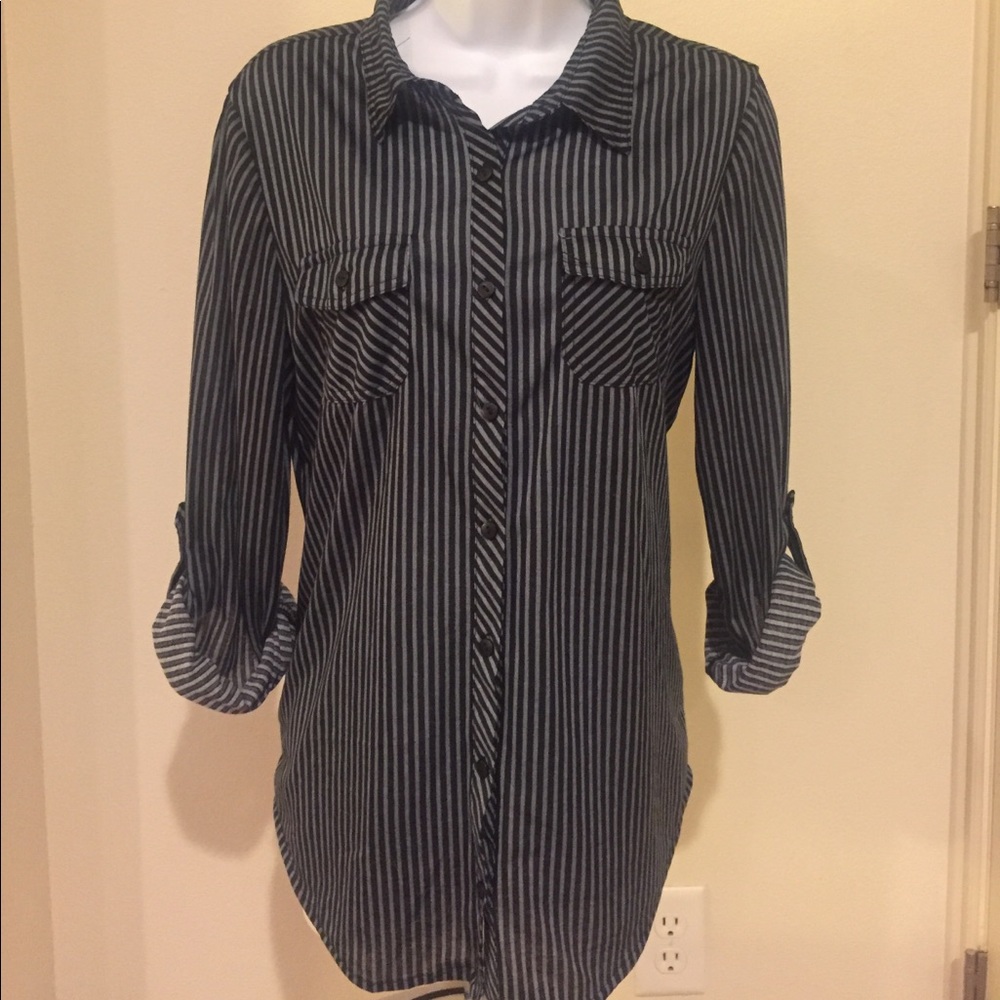 Never worn women's long sleeve button down shirt.
