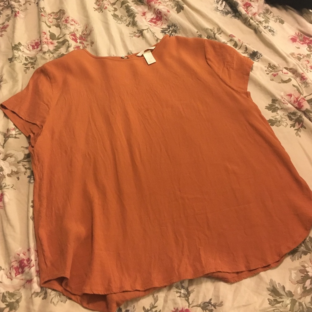 Orange short sleeve shirt