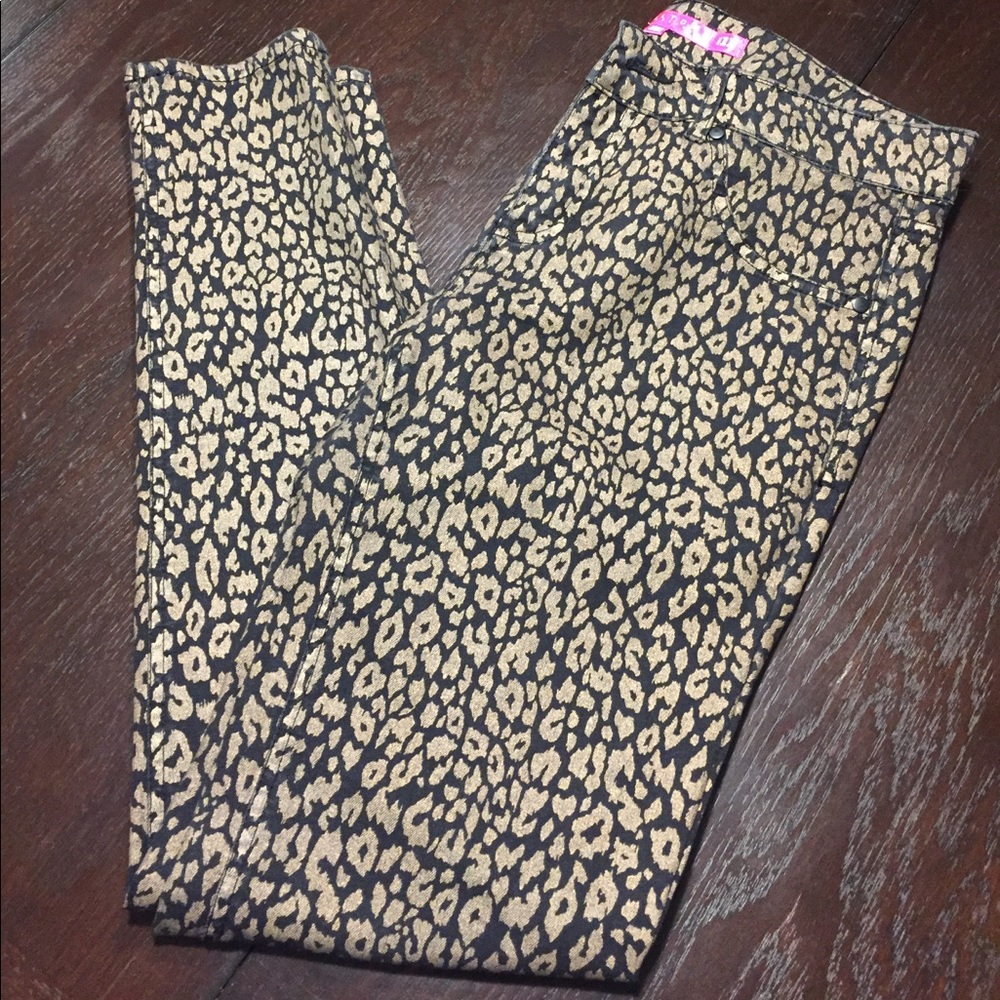 Black and gold animal print skinny jeans