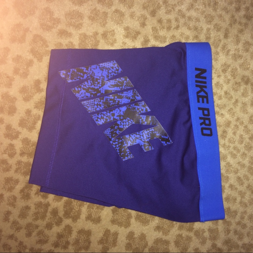 Blue patterned nike pros