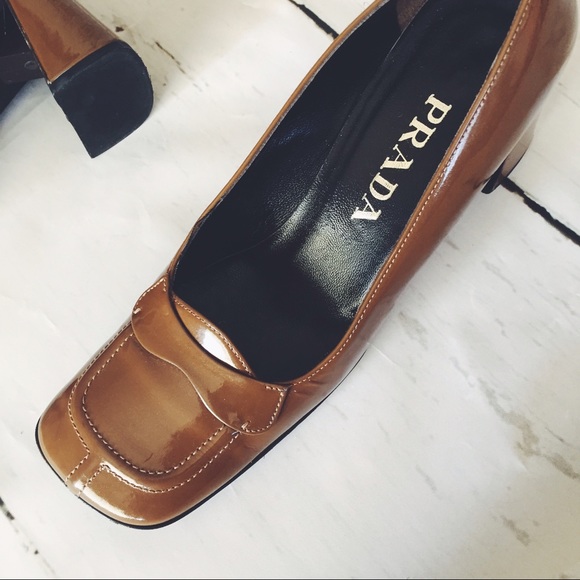 prada monogram heeled loafers