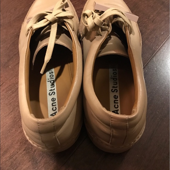 Acne Studio: White/Cream Leather Low Top Sneakers | Men Acne Studios Sneaker
