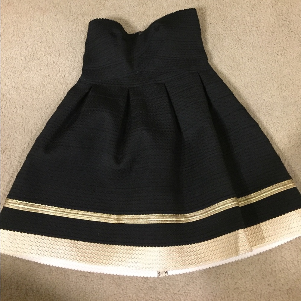 Structured black and gold dress. Never worn.